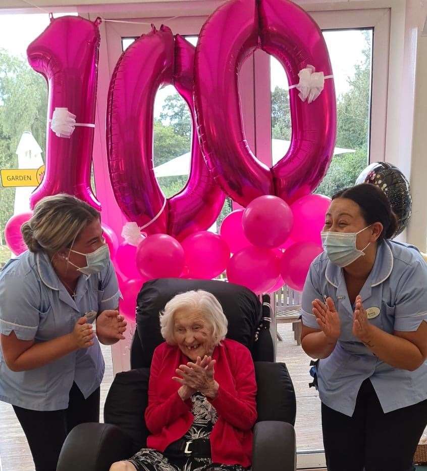 Ivy Watson on her birthday with carers Teigan Clifton (left) and Emily Sanders. Picture: Laura Tierney