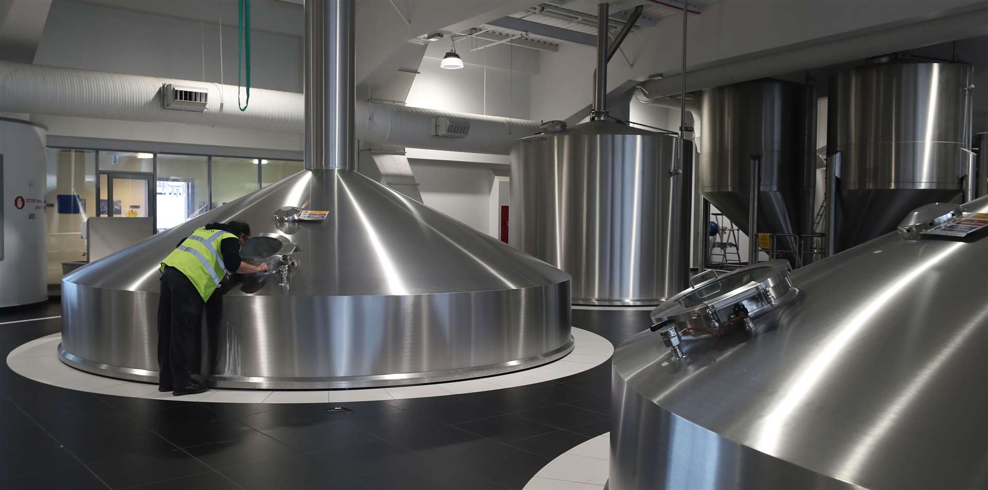 Brewing team member Steve Gilson checks on the progress of a tank of Guinness at the St James’s Gate brewery (Niall Carson/PA)