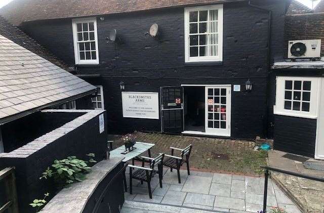 Living up to its name, the pub has been painted with plenty of black paint.
