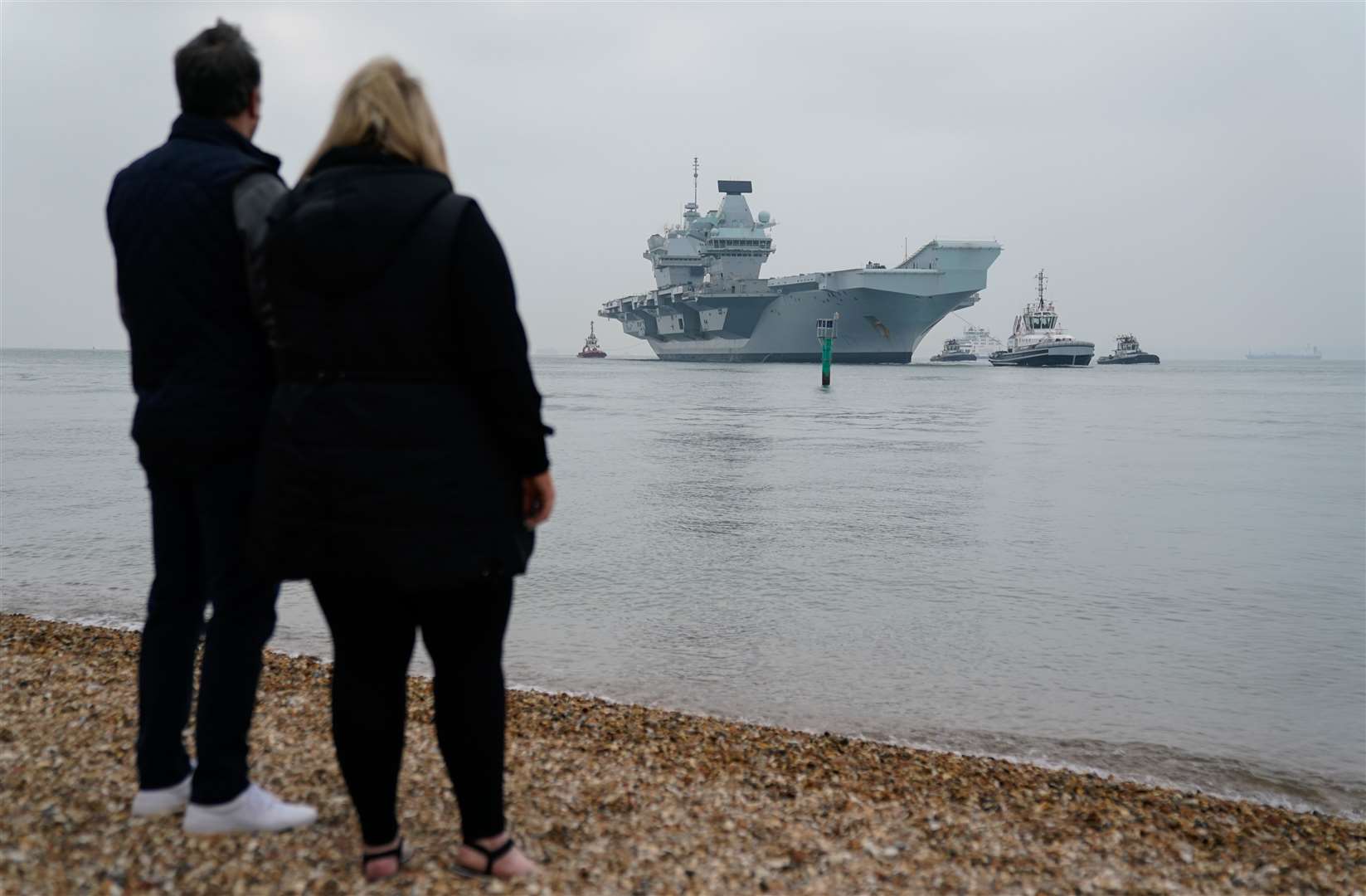 HMS Queen Elizabeth is one of two carriers which are the largest and most powerful vessels ever built for the Royal Navy (Andrew Matthews/PA)