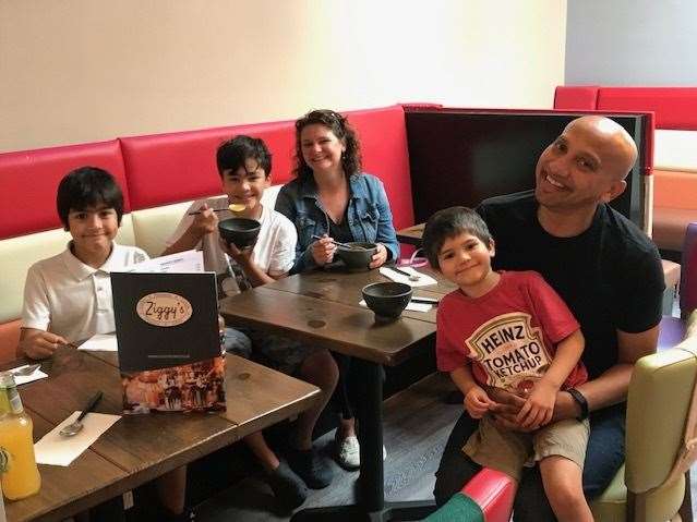 The Solanky family having lunch and ice cream