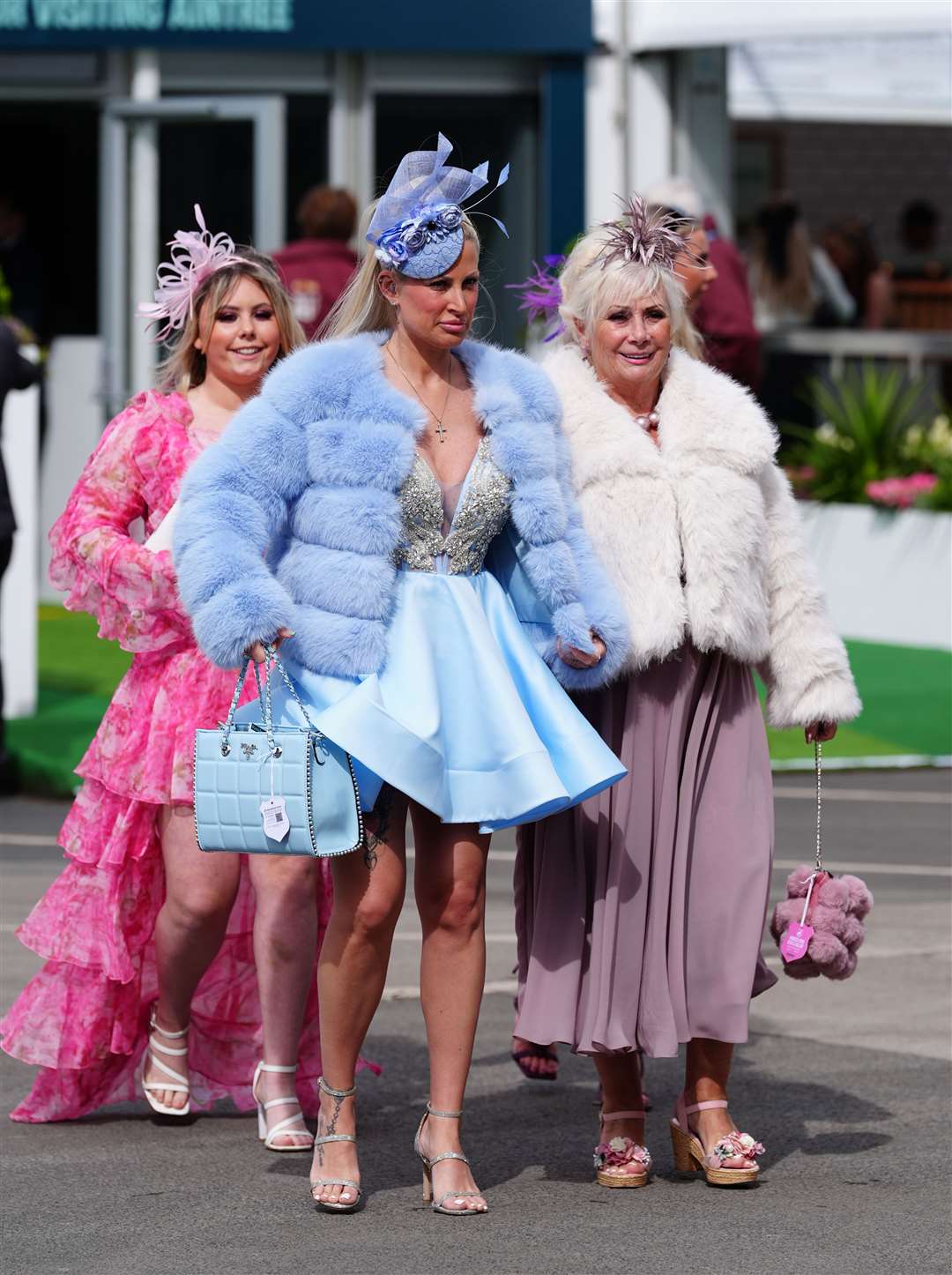 Some visitors wrapped up in colourful coats (Peter Byrne/PA)