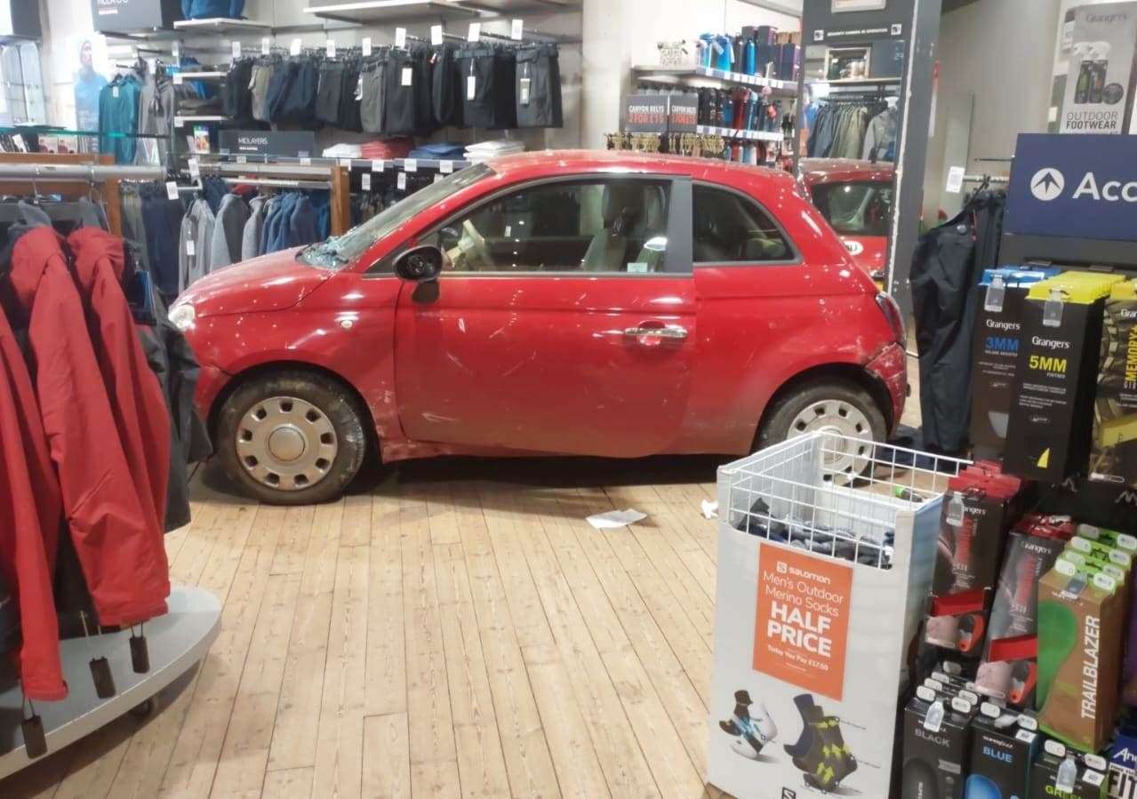 Eyewitnesses were left stunned after a red Fiat 500 ploughed into the Blacks outdoor shop in Tunbridge Wells. Photo: Ollie Brock