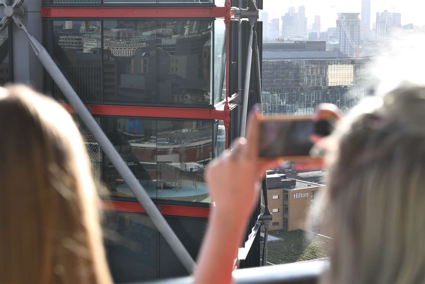 People take pictures from the viewing platform at the centre of the Supreme Court case (Victoria Jones/PA)