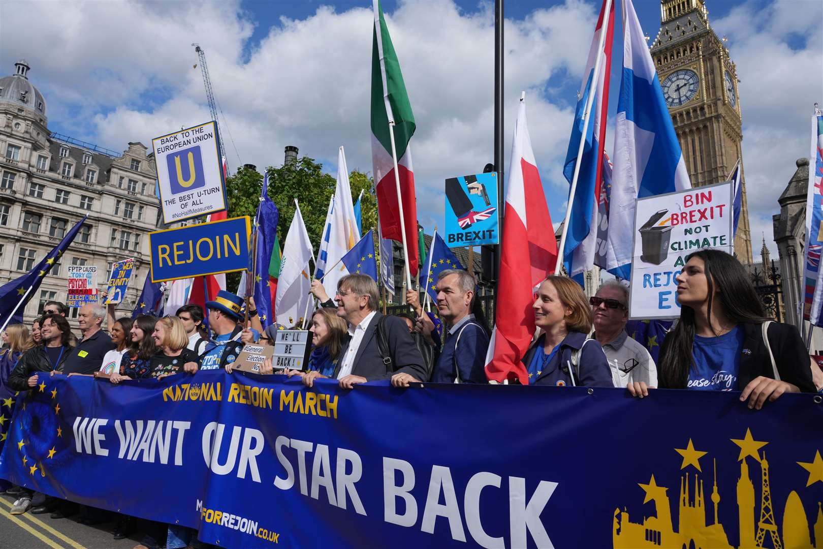 Supporters held placards that called for a new referendum on re-joining the EU (Jeff Moore/PA)