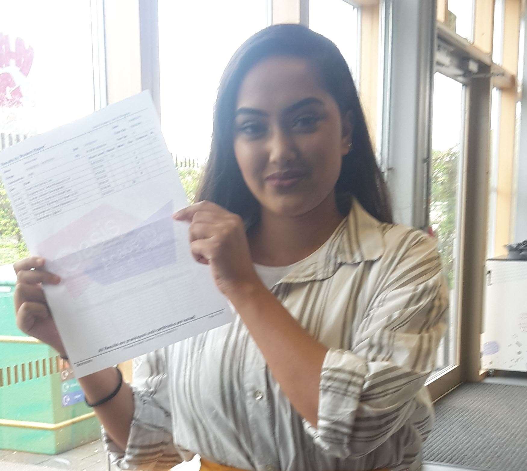 Oasis Academy student Anisa Islam, 18, with her A-level results