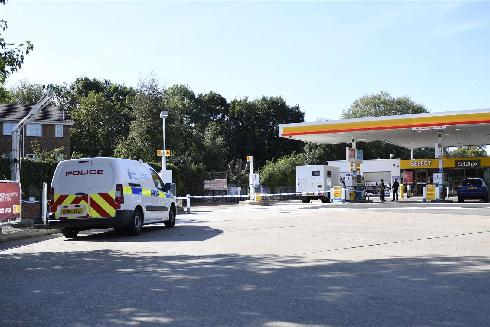 Police at the scene after Peter Henderson carried out the daylight raid of the Loomis security at the Shell petrol garage in Malling Road, Snodland. Picture: Barry Goodwin