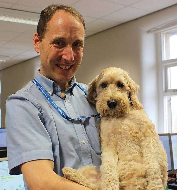 Hospital chaplain David Anderson and cockapoo Jasper will help switch on the Illuminations (Visit Blackpool/PA)