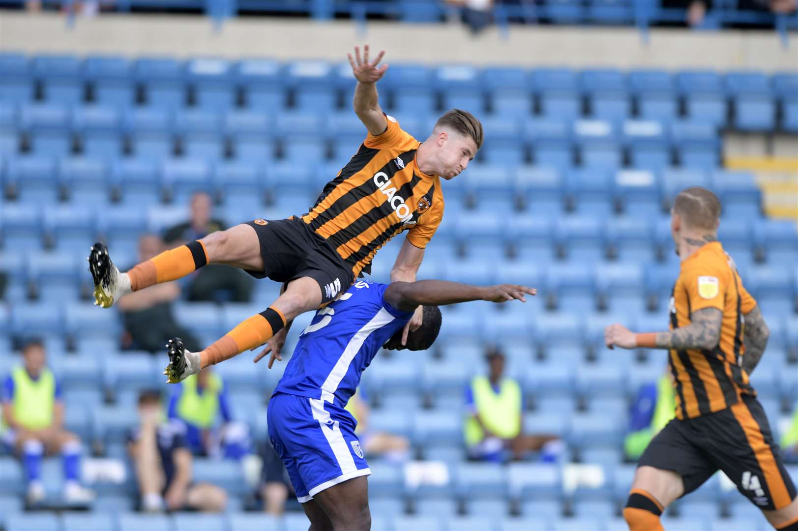 John Akinde is challenged for the ball Picture: Barry Goodwin