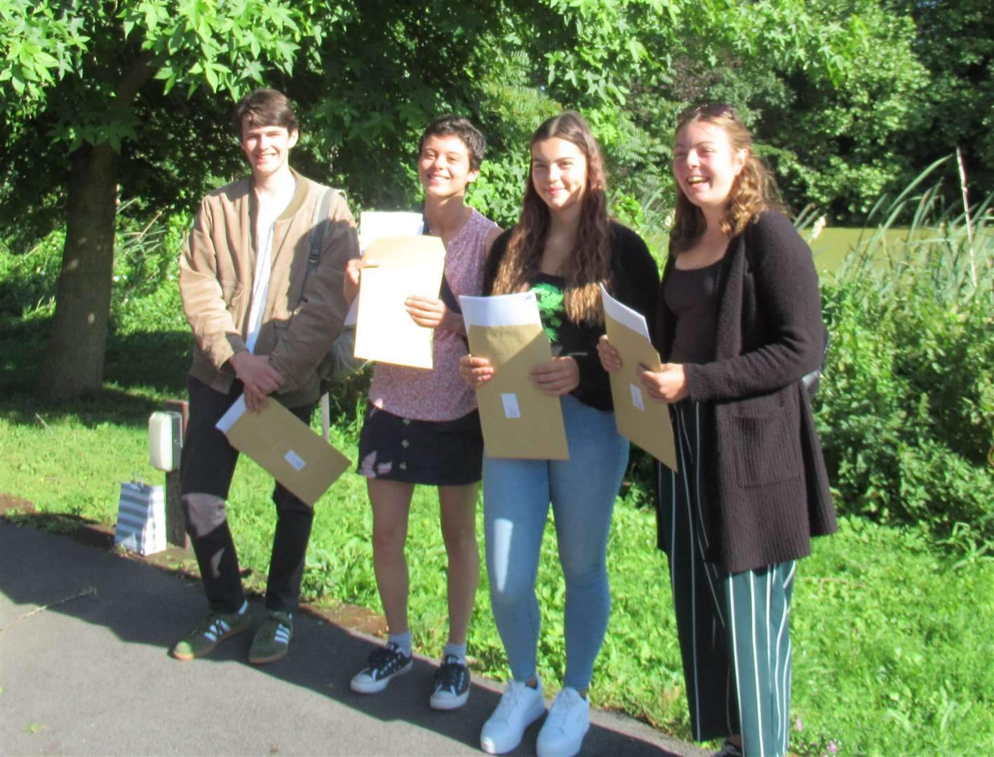 Pupils at Barton Court Grammar School in Canterbury collect their A-level results