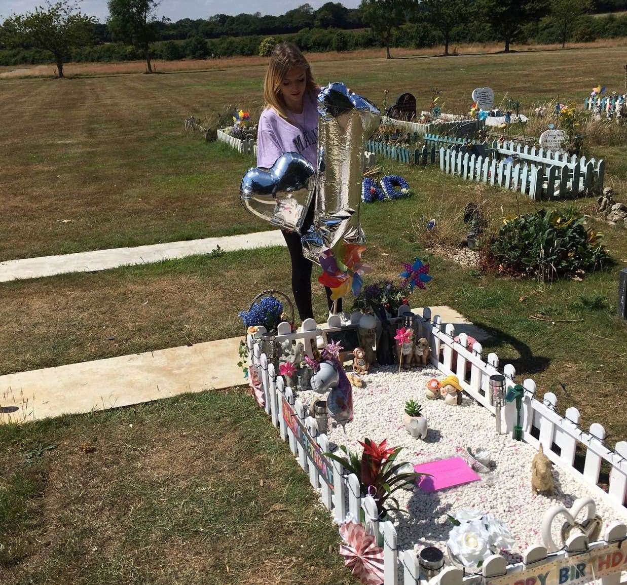 Miss Bourne says she finally feels happy that her daughter can keep her "beautiful fence"