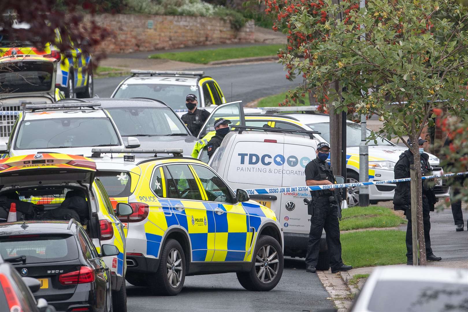 Armed police officers outside a property in Westwood Avenue, Ipswich (Joe Giddens/PA)