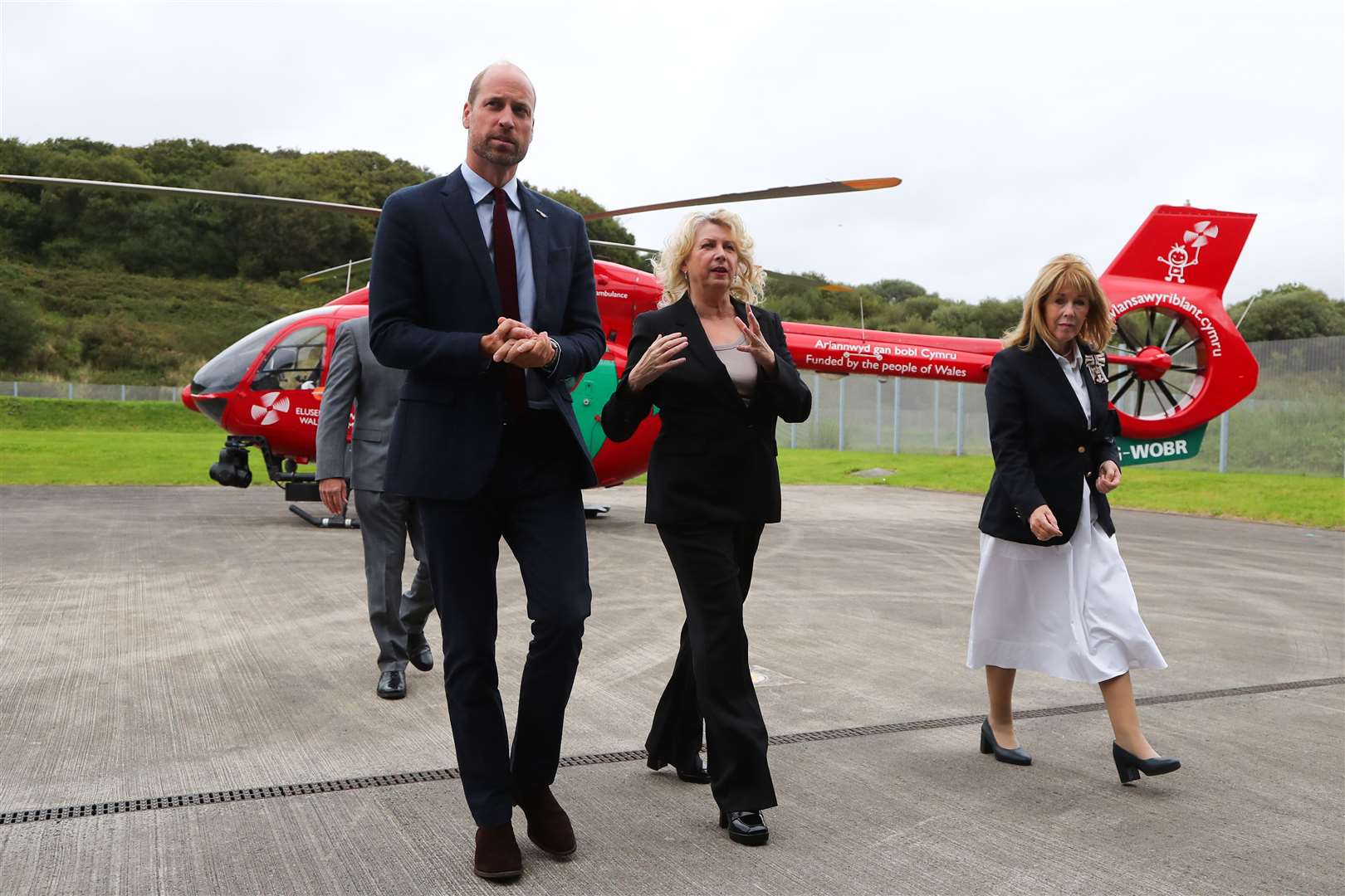 William, patron of Wales Air Ambulance, with chief executive of the Wales Air Ambulance Charity Sue Barnes (Geoff Caddick/PA)