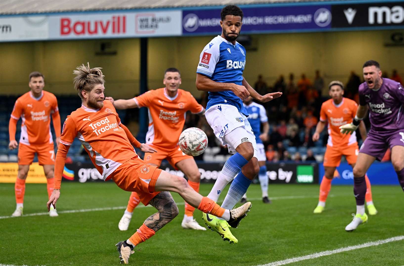 Gillingham’s Tim Dieng in the thick of the action in the FA Cup first round. Picture: Keith Gillard