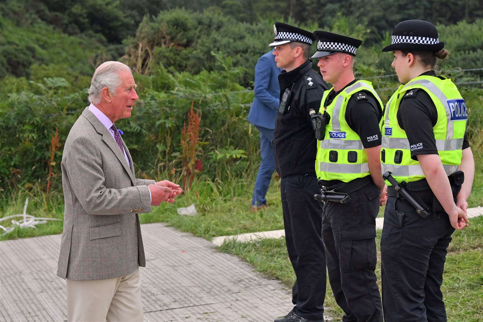 The Prince of Wales meets Pc Eilidh McCabe, right, and Pc Liam Mercer, second from right, the first two police officers who attended the scene (Ben Birchall/PA)