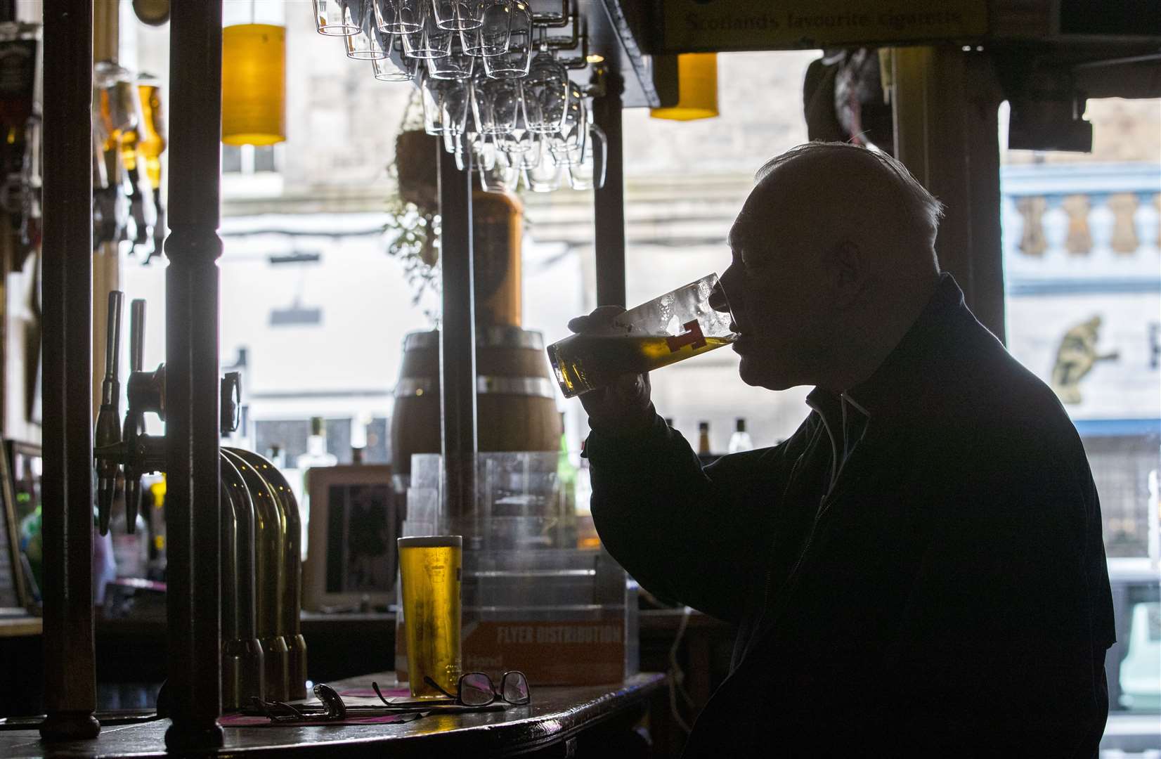 Pub-goers in every part of Scotland apart from Glasgow can now enjoy a pint indoors (Jane Barlow/PA)