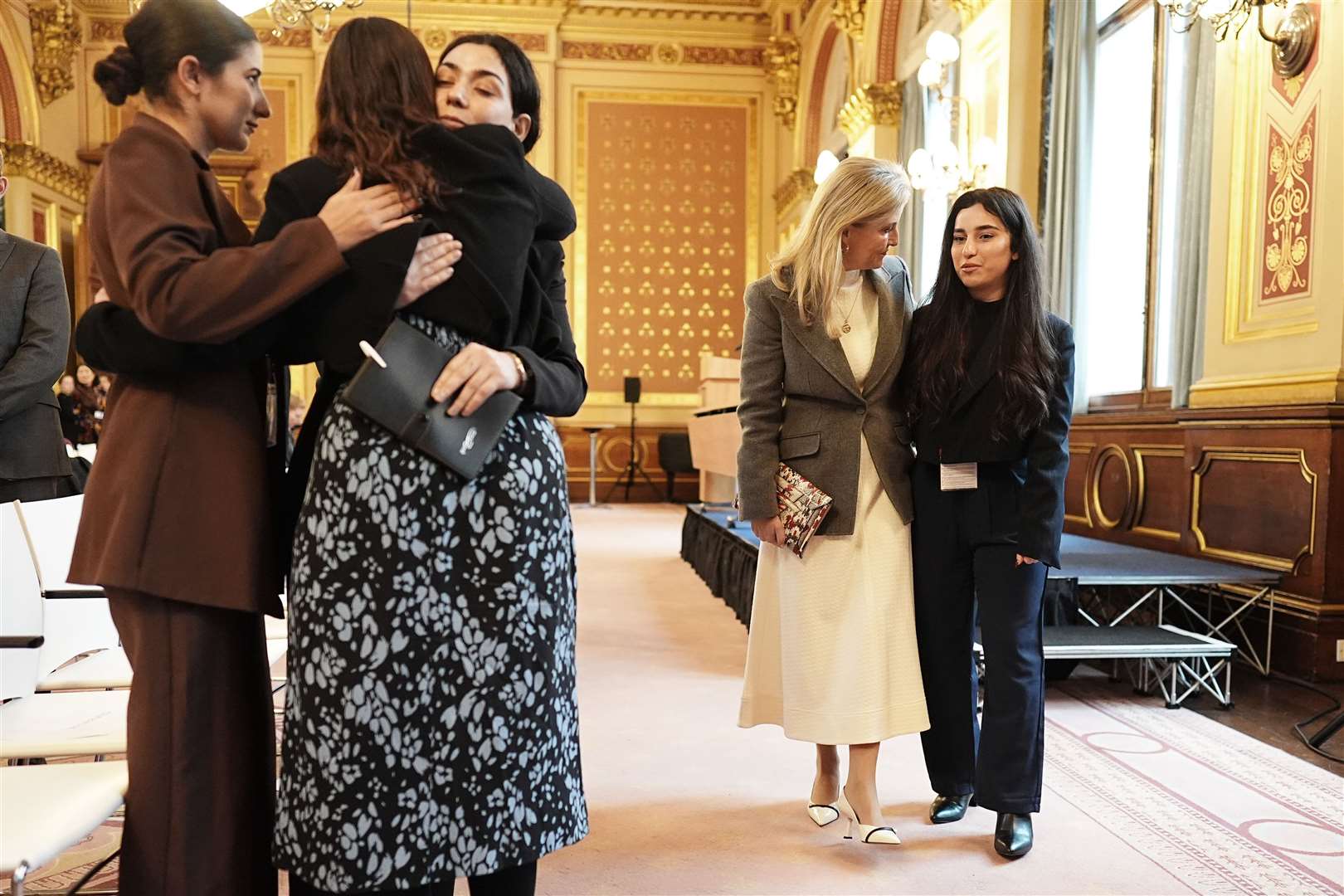 The Duchess of Edinburgh speaking to Yazidi survivor Awaz Abdi (right) during her visit to view The Women Who Beat ISIS exhibition (Aaron Chown/PA)