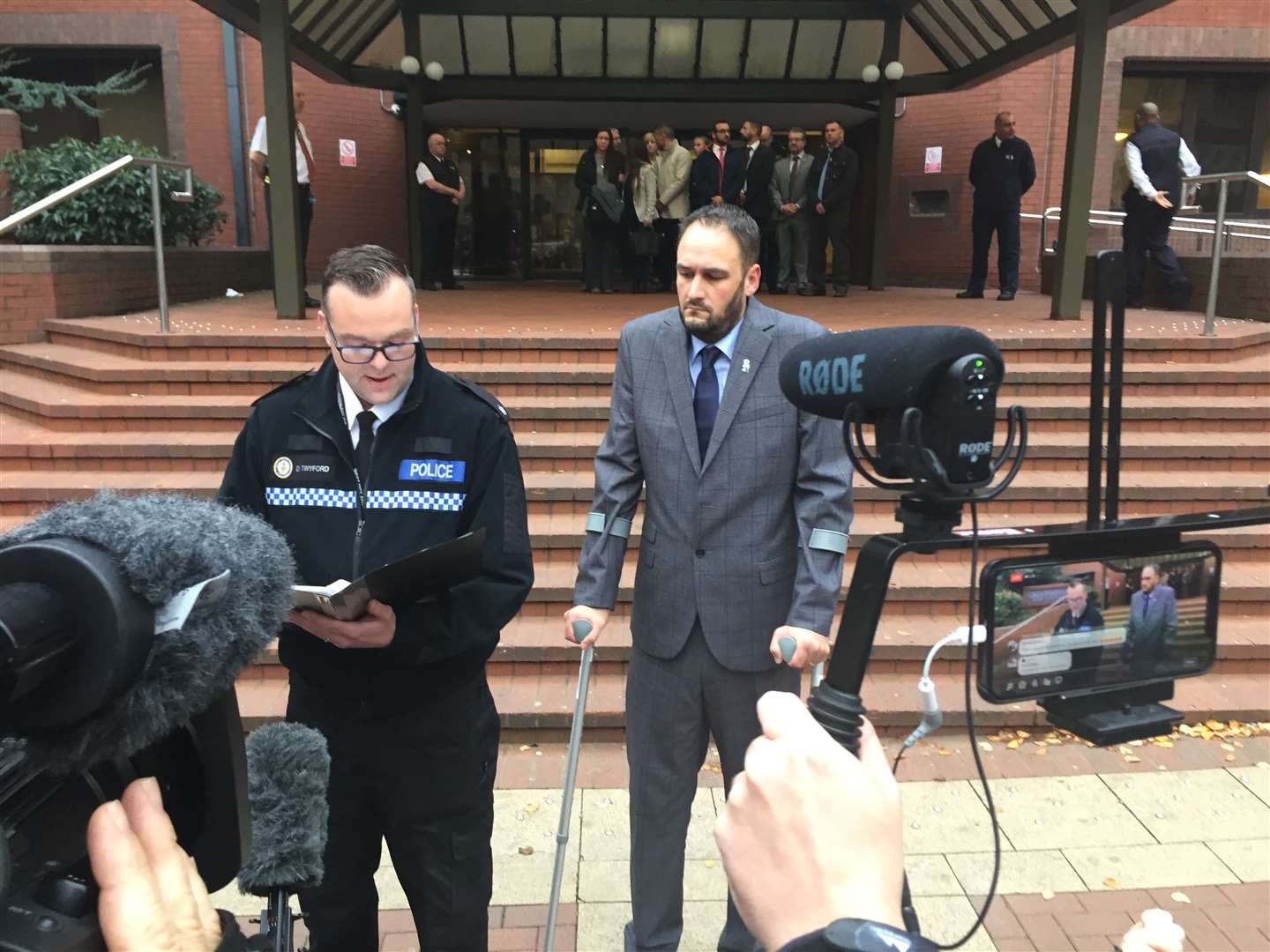 Pc Gareth Phillips on crutches last October outside Birmingham Crown Court after car thief Mubashar Hussain was jailed for 12 years (Matthew Cooper/PA)