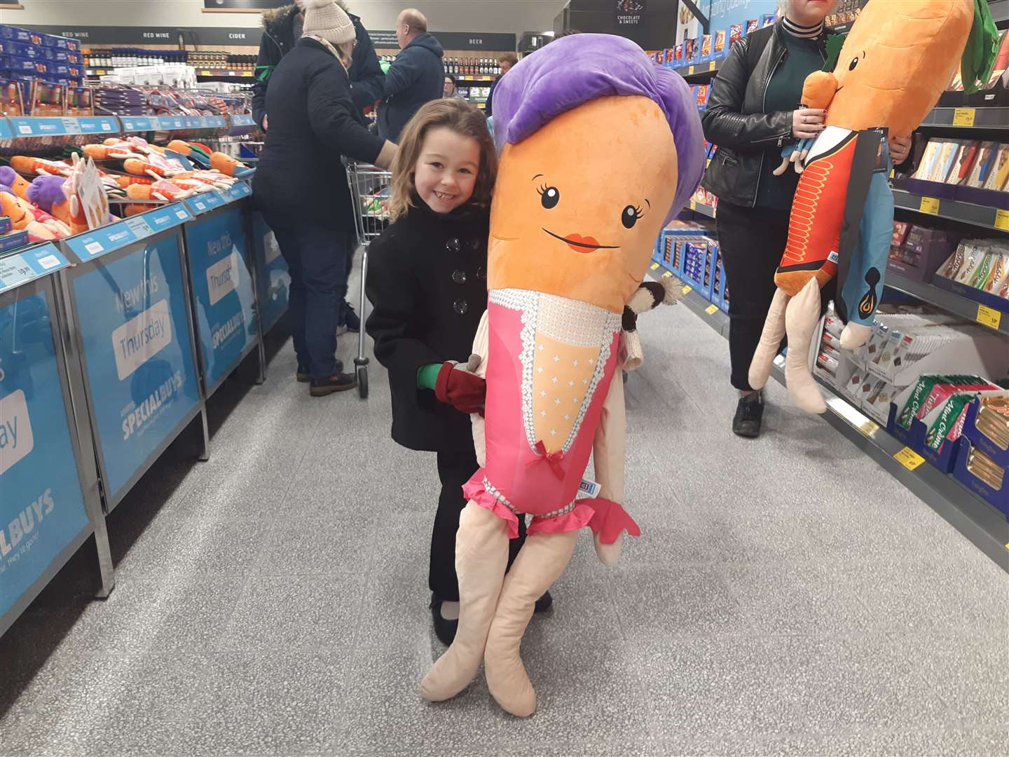 Six-year-old Oceanna Broadhurst with her giant Katie the Carrot