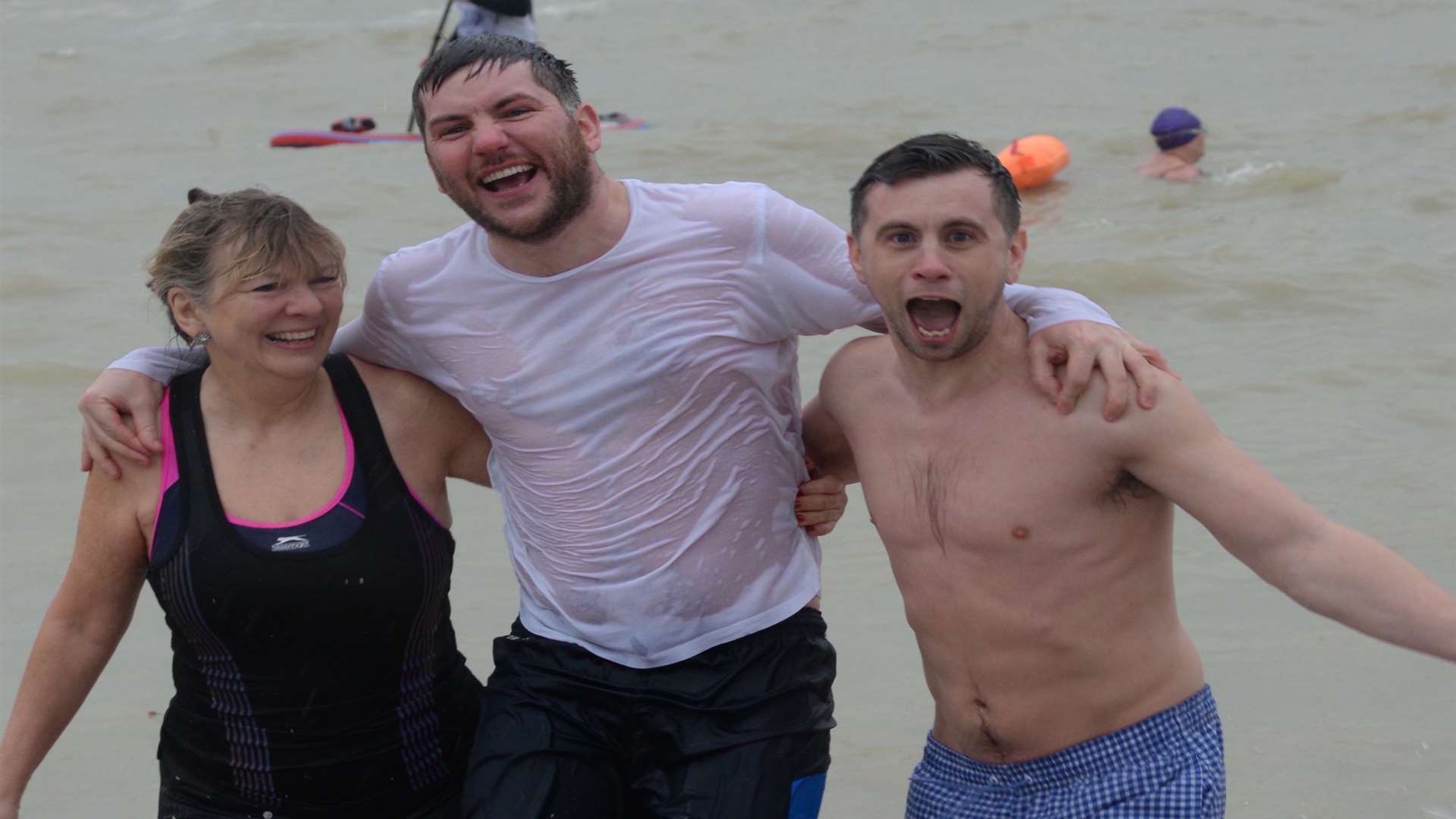 Terri Hart, James Clare and Jack Warren making a splash