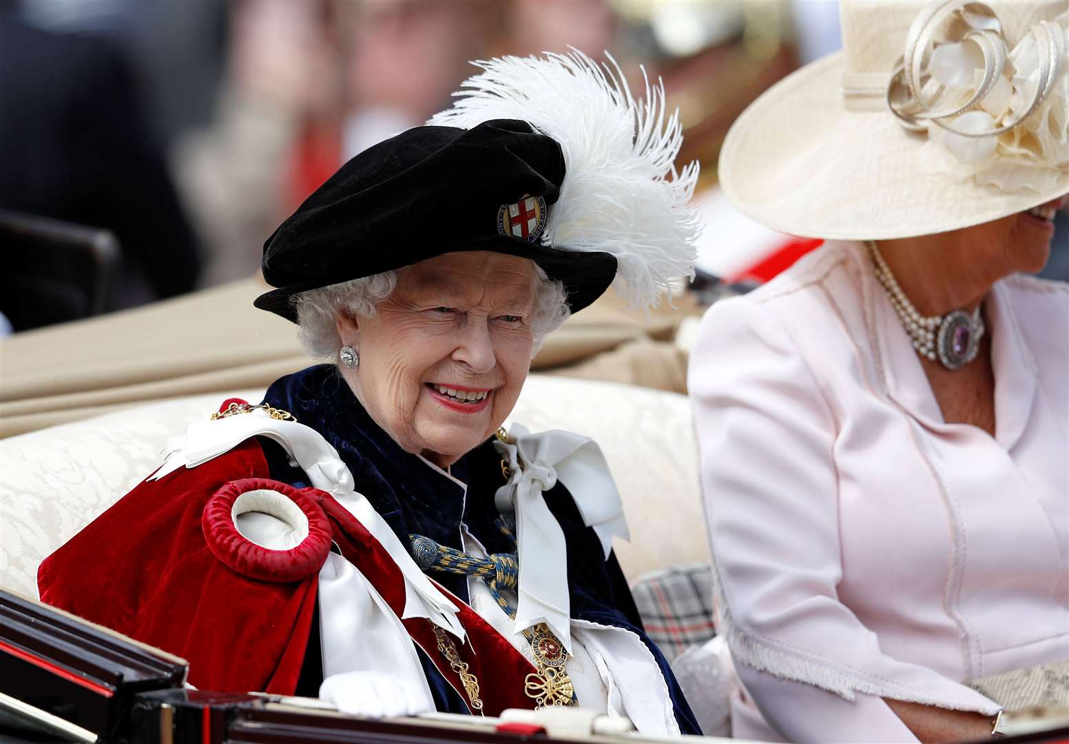 Queen Elizabeth II travels in a carriage as she leaves the Order of the Garter Service at Windsor Castle in 2019 (Peter Nicholls/PA)