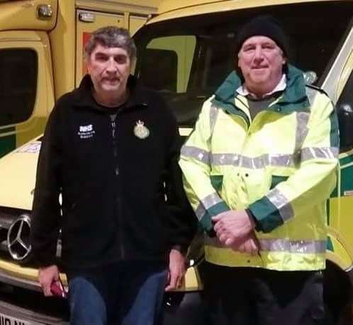 Old mates: ex-cop Melvin Hopper, left, with former colleague Andy Parr driving ambulances during the coronavirus pandemic