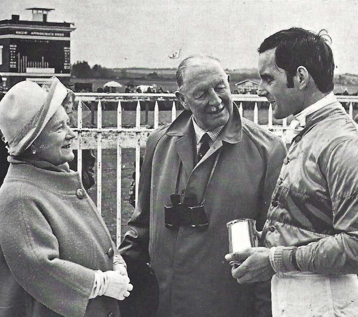 Queen Elizabeth The Queen Mother chats to jockey David Mould at Folkestone with Lord Cornwallis, the Lord Lieutenant of Kent