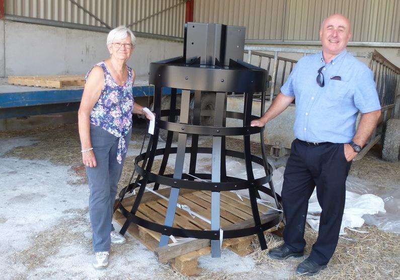 Thelma Dudley, Newington History Group secretary, and Dean Coles, NHG chairman, with the beacon basket