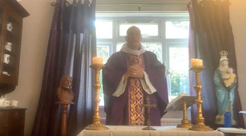 Fr Robert Lane, vicar of Borden, broadcasting from his living room