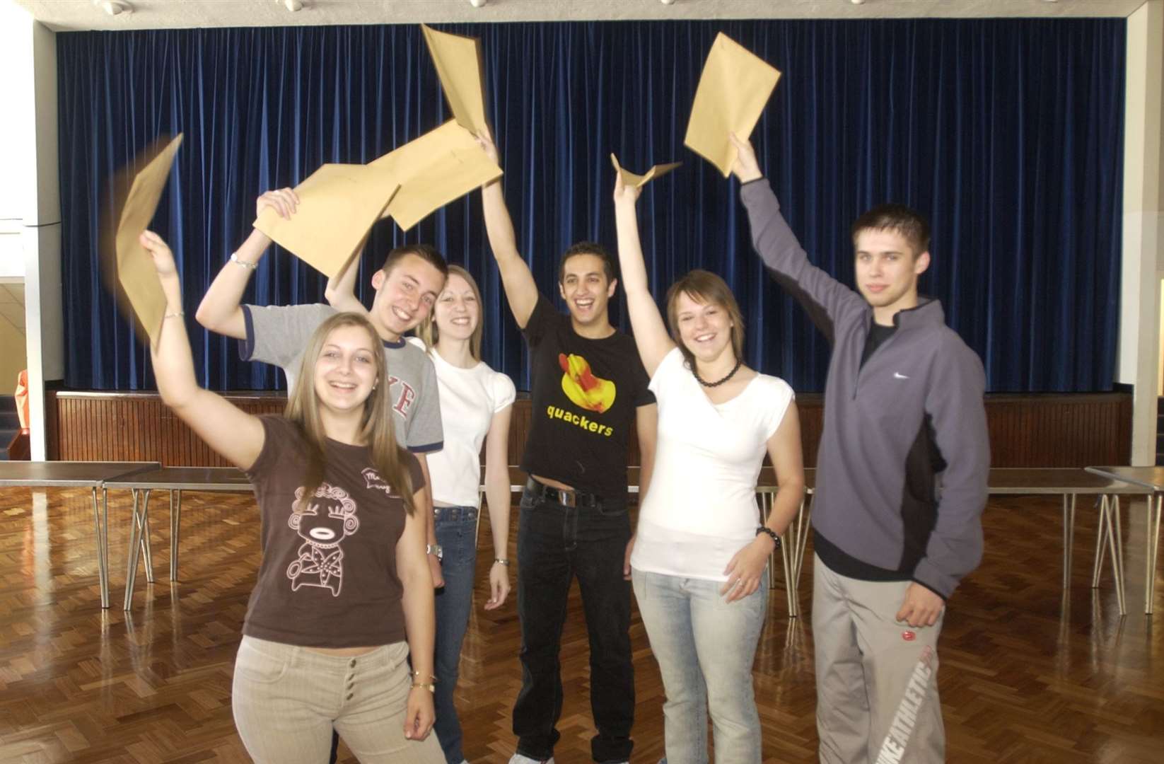 A group of pupils celebrating after receiving their A-level results at the Thomas Aveling School in Rochester in 2004. Picture: Gavin Crayford