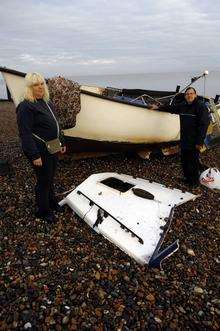 Tina and John Chapman by their shipwrecked boat in Herne Bay