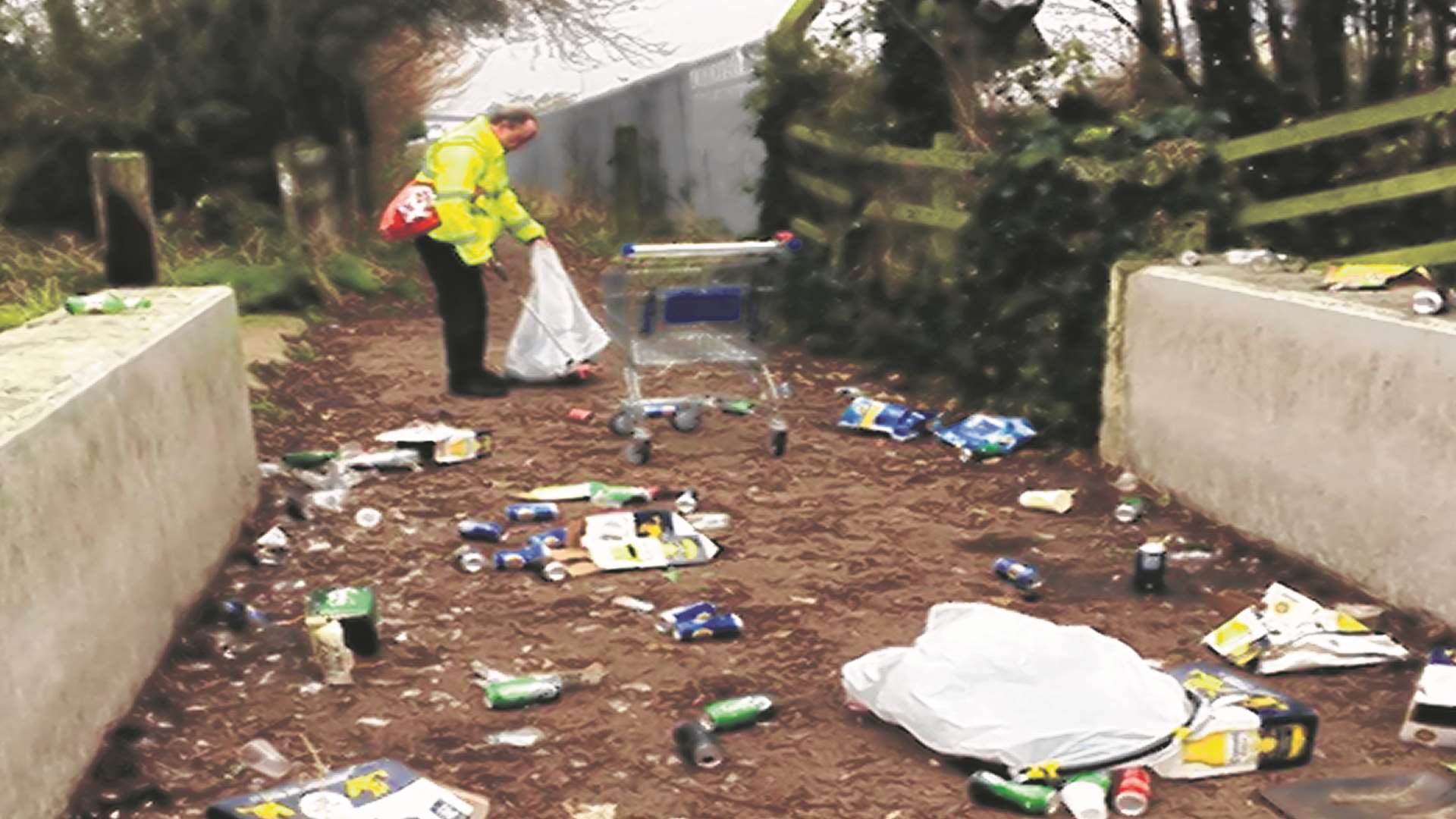 Sprucer Pete Phillips clears the litter strewn path in Caesar's Way in Cheriton. Picture: Folkestone Town Sprucer