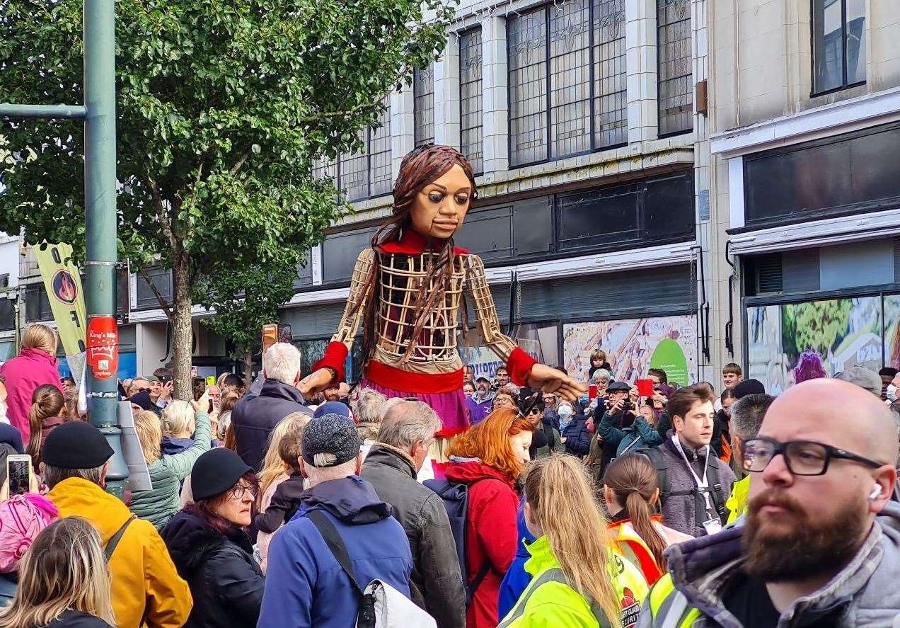 The 11ft 6in-tall puppet towers over crowds in Canterbury city centre. Picture: Gerry Warren