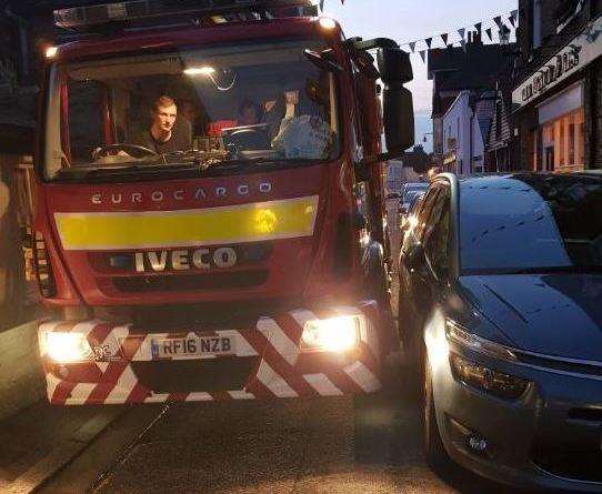 This fire engine could not pass because of the way four vehicles had parked in Delf Street, Sandwich