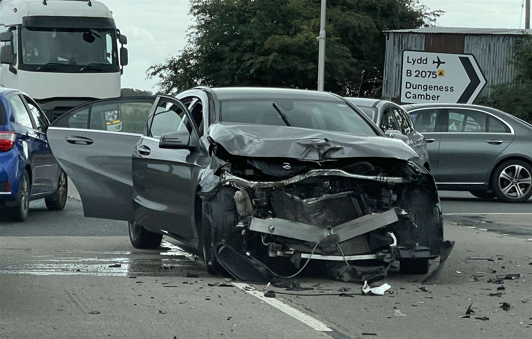 A grey Mercedes has suffered heavy damage