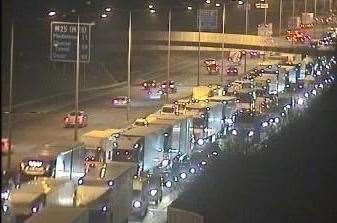 Four-mile queues are being reported at the Dartford Tunnel following a crash involving three lorries