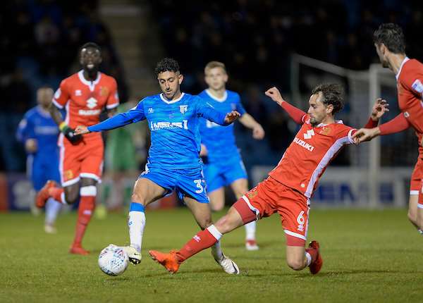 Gillingham's Navid Nasseri against MK Dons' Dean Lewington Picture: Ady Kerry (1341587)