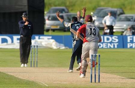 Yasir Arafat, with figures of 3-23, was Kent's most productive bowler, seen here removing Ben Phillips, lbw, for 14.