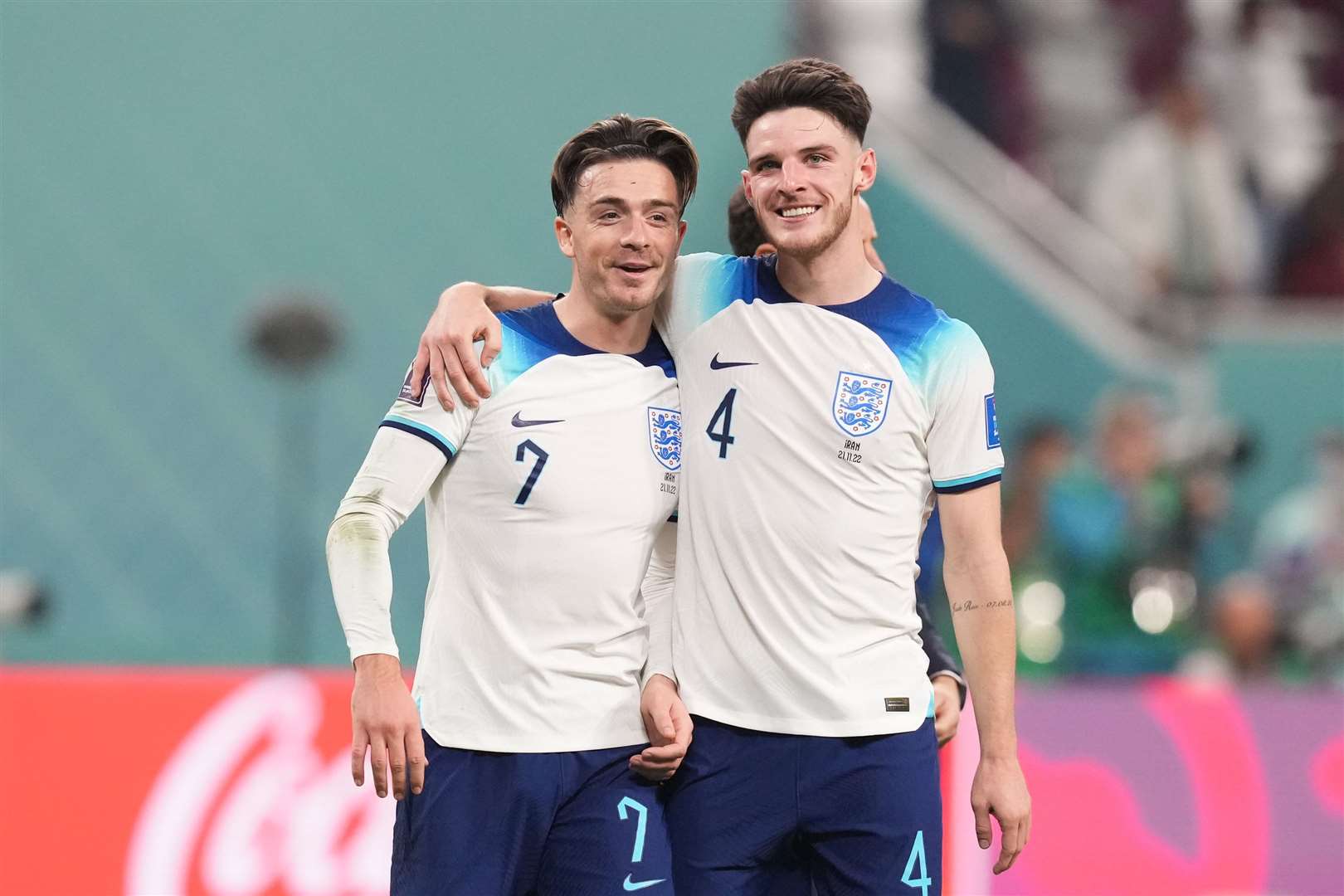 England’s Jack Grealish celebrates with team-mate Declan Rice following their win against Iran (Martin Rickett/PA)