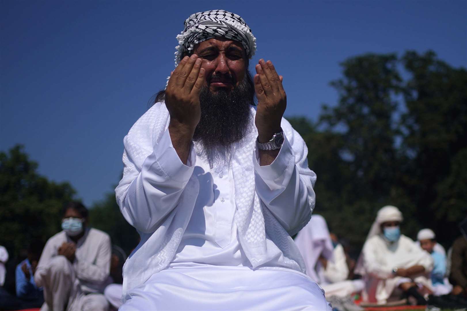 People during morning prayer during Eid al-Adha (Victoria Jones/PA)