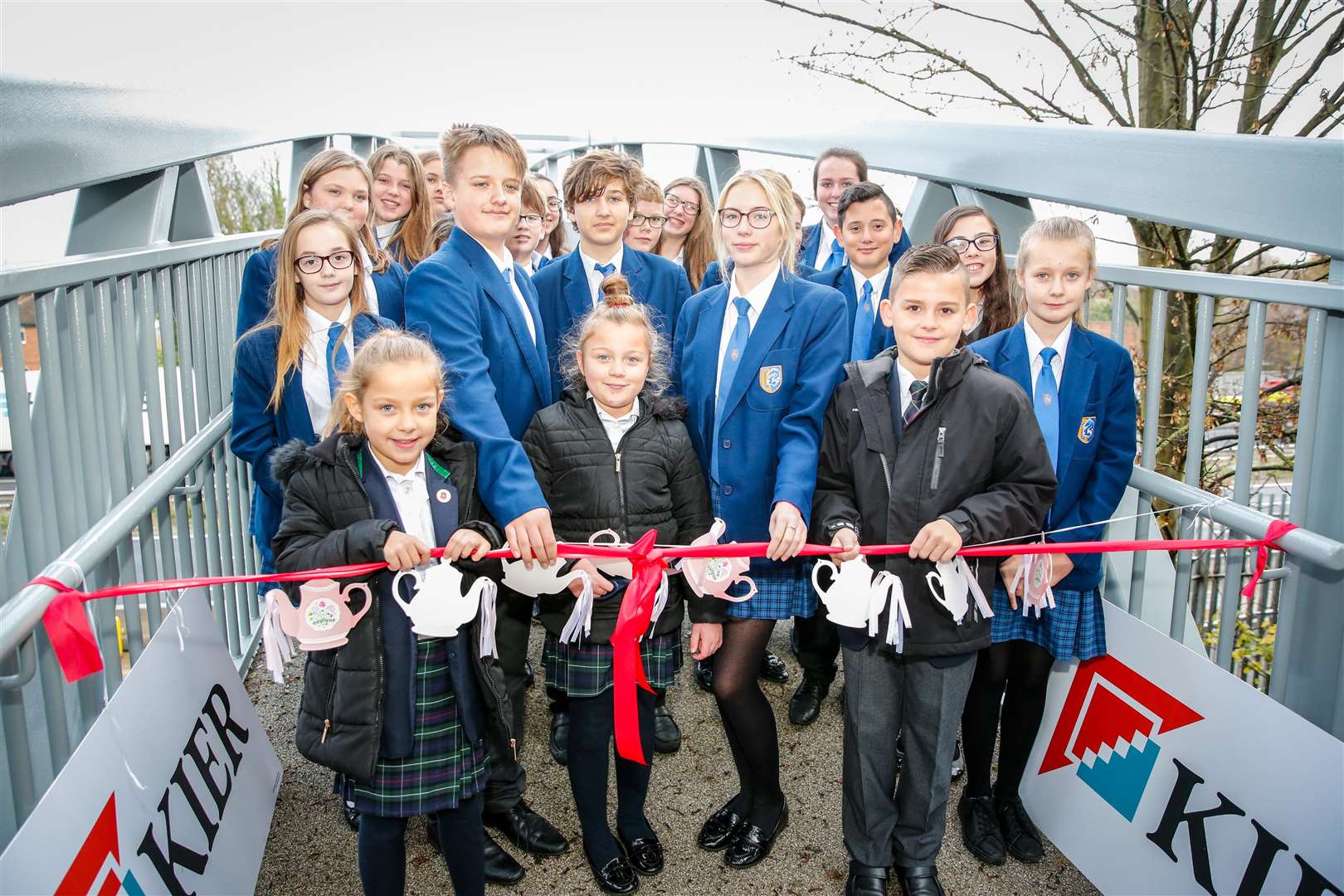Olivia and Emily Street, McKenzie Preston, Rebecca Polwarth, Sonny Boswell and other pupils from Aylesford School and Aylesford Primary School open the bridge. Picture: Matthew Walker