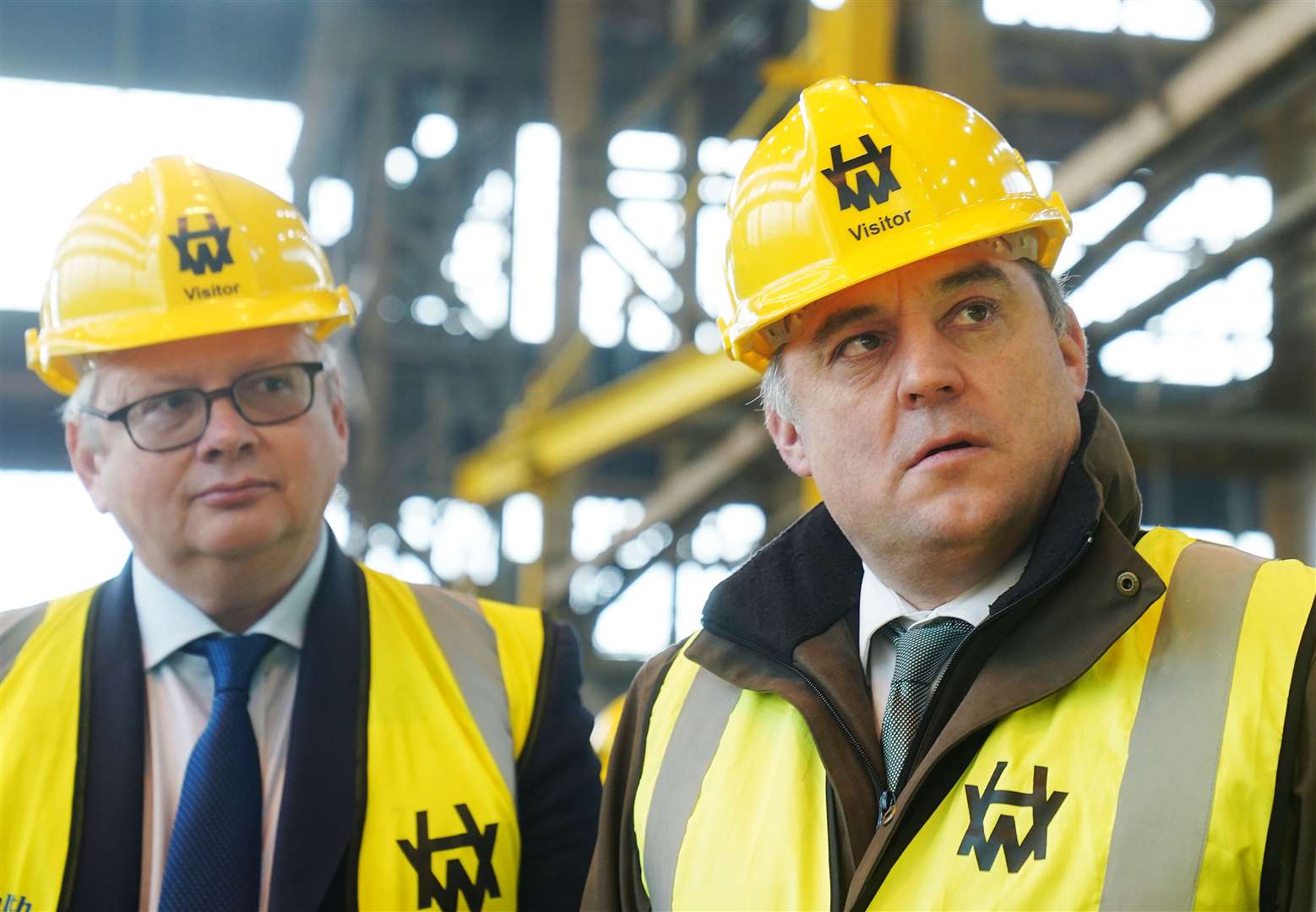 Then defence secretary Ben Wallace (right) with CEO John Wood (left) during a visit to Harland & Wolff shipyard factory in Belfast in January 2023 (Brian Lawless/PA)