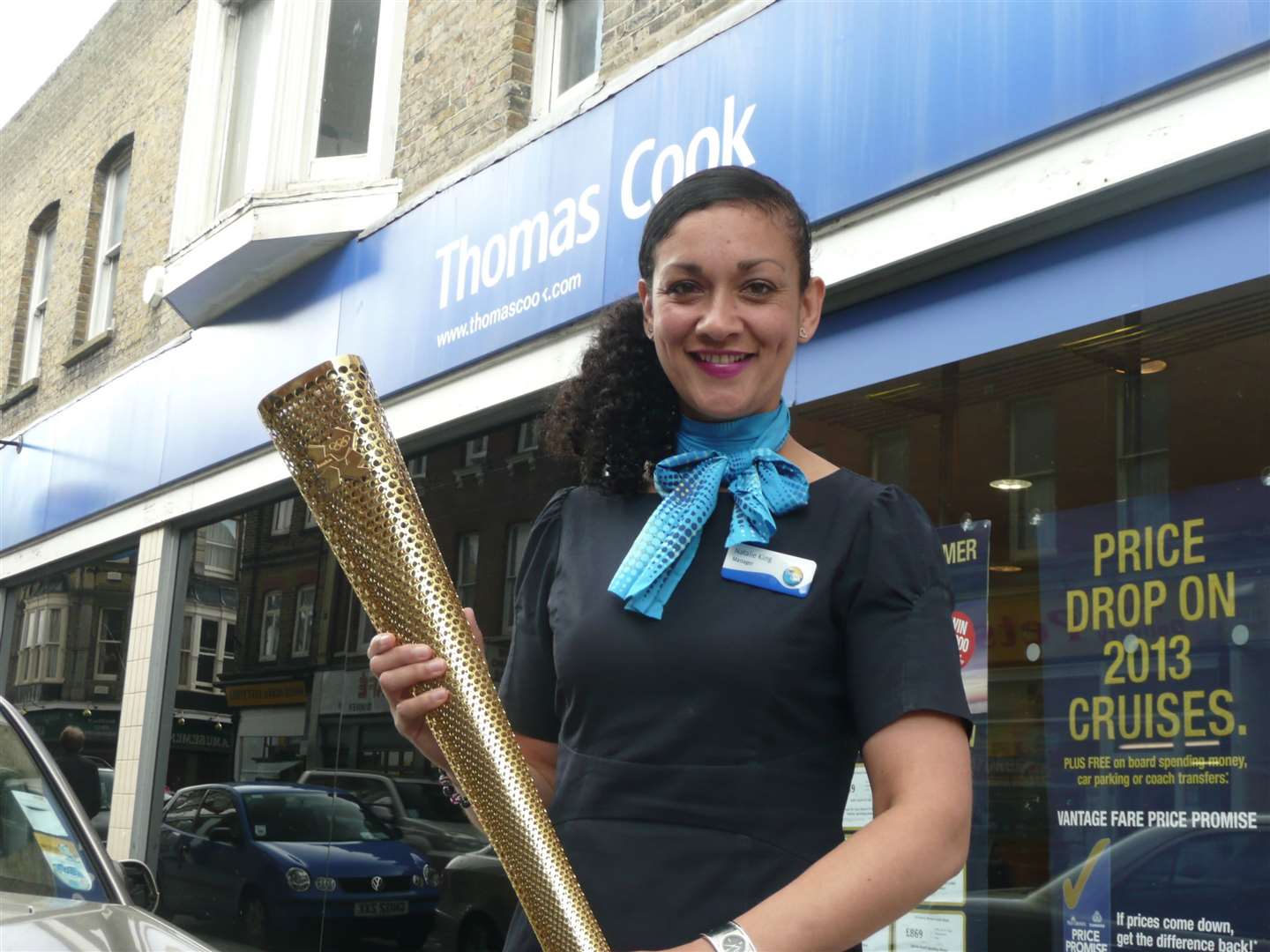 Natalie King, manager of Thomas Cook in Dover, with her Olympic torch