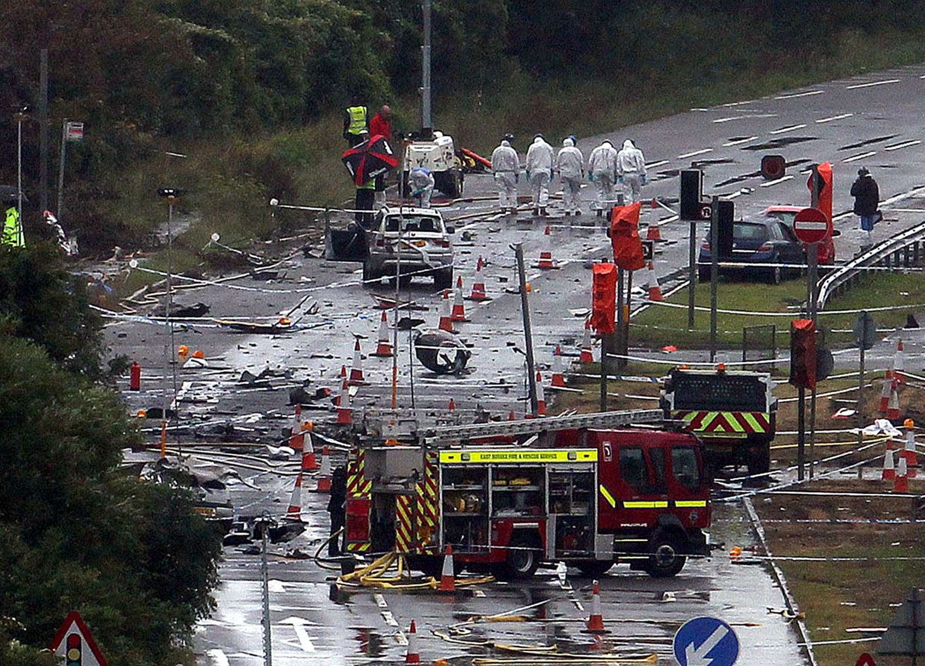 Emergency services on the A27 at Shoreham in West Sussex after a Hawker Hunter fighter jet plummeted onto the major south coast road after failing to pull out of a loop manoeuvre (Steve Parsons/PA)