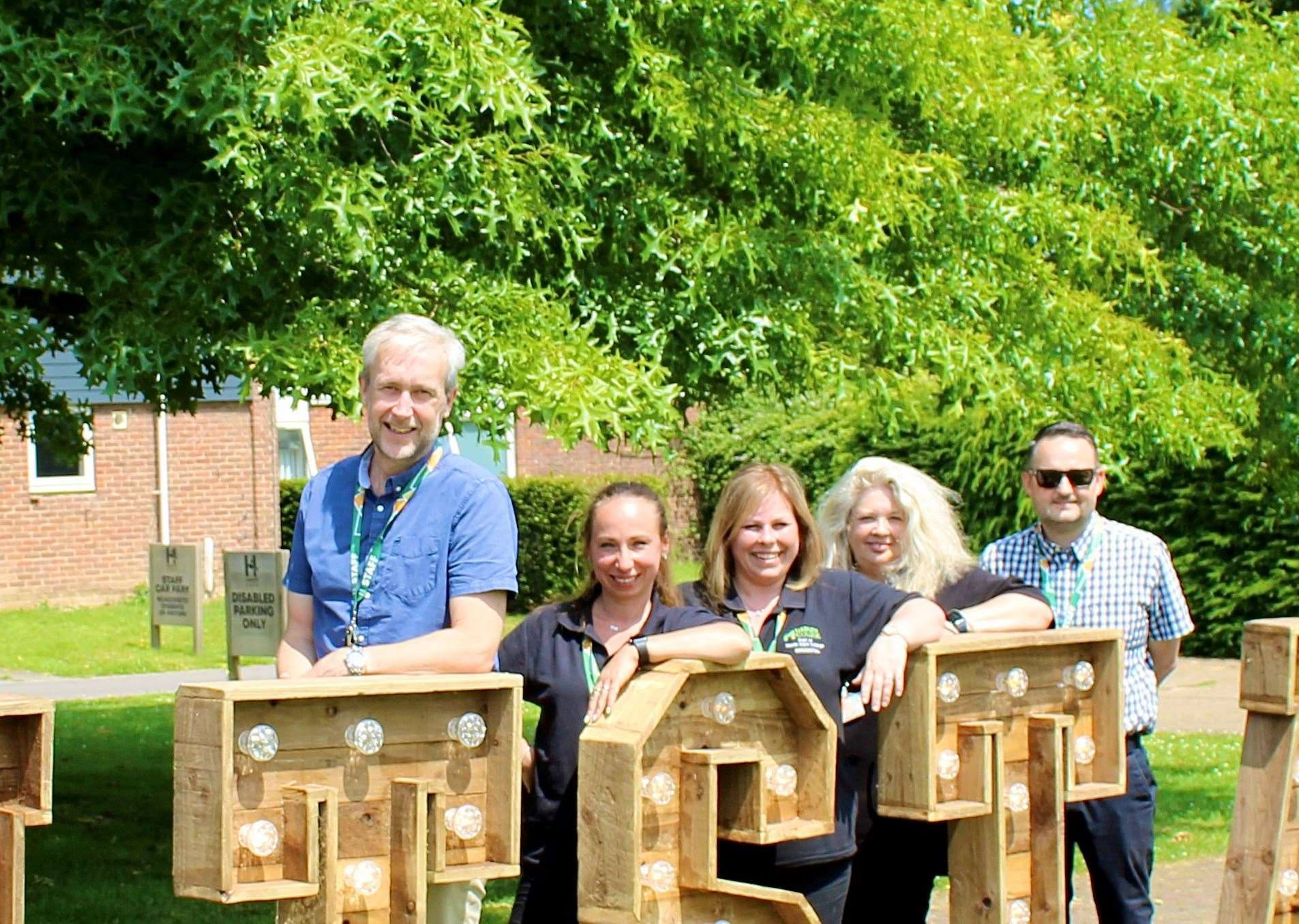 Vice principal for Hadlow College, Chris Lydon, left, and assistant principal Dan Cotton, right, with the residential team. Picture: Hadlow College