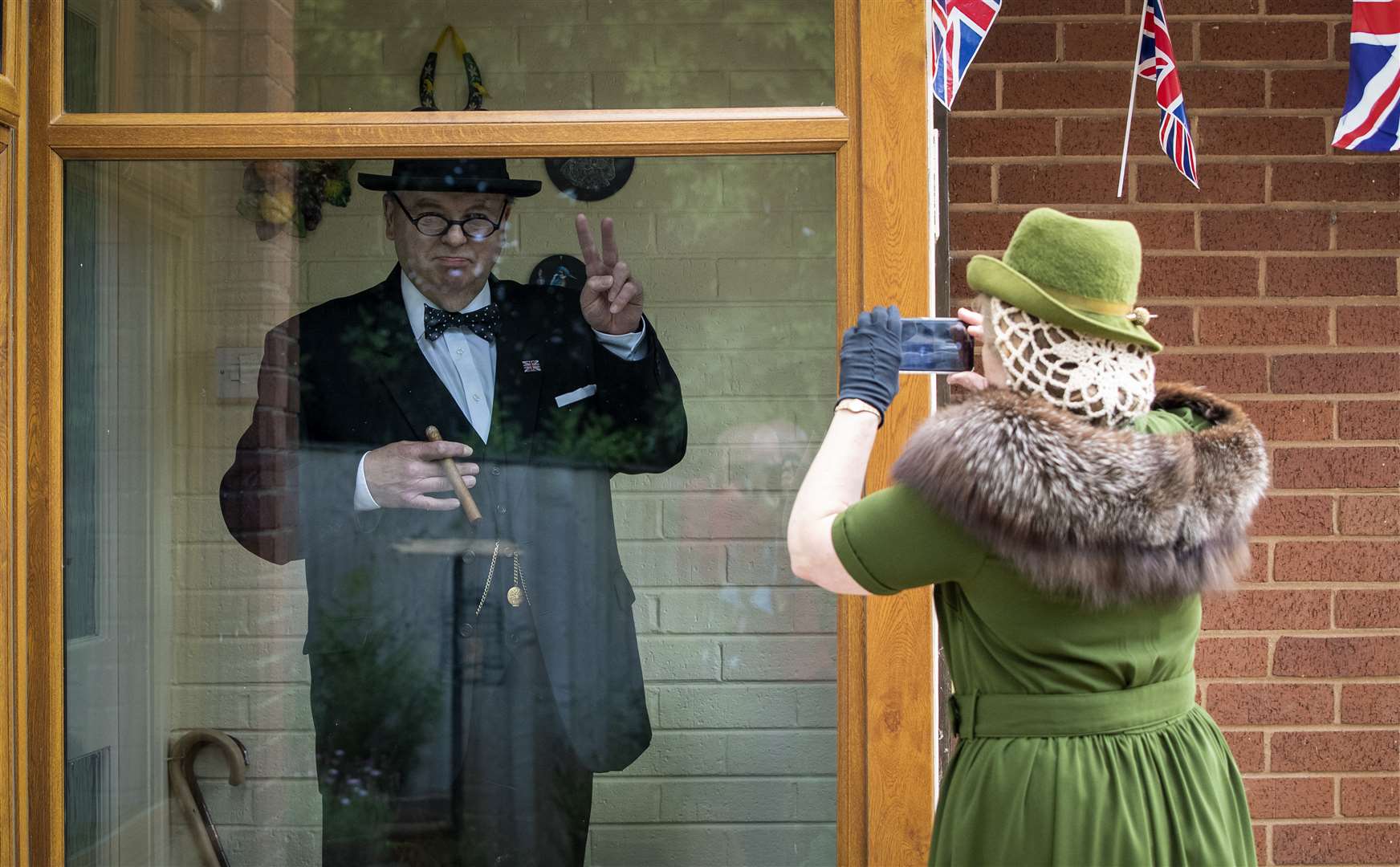 Winston Churchill impersonator Derek Herbert with his wife Linda (Peter Byrne/PA)