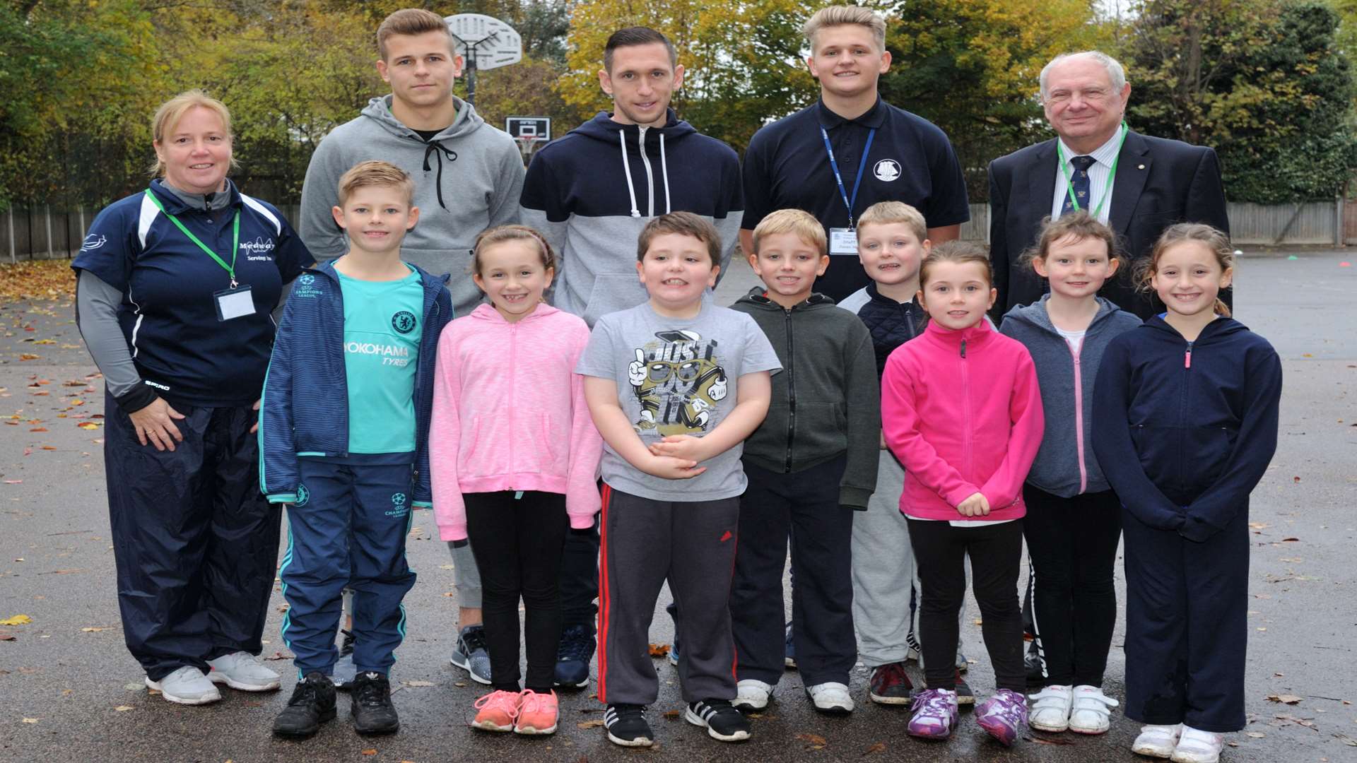 L/R, Medway's Tina Spry, Jake Hessenthaler, Andy Crofts sport apprentice James Hare and Cllr David Brake with Year 4 pupils