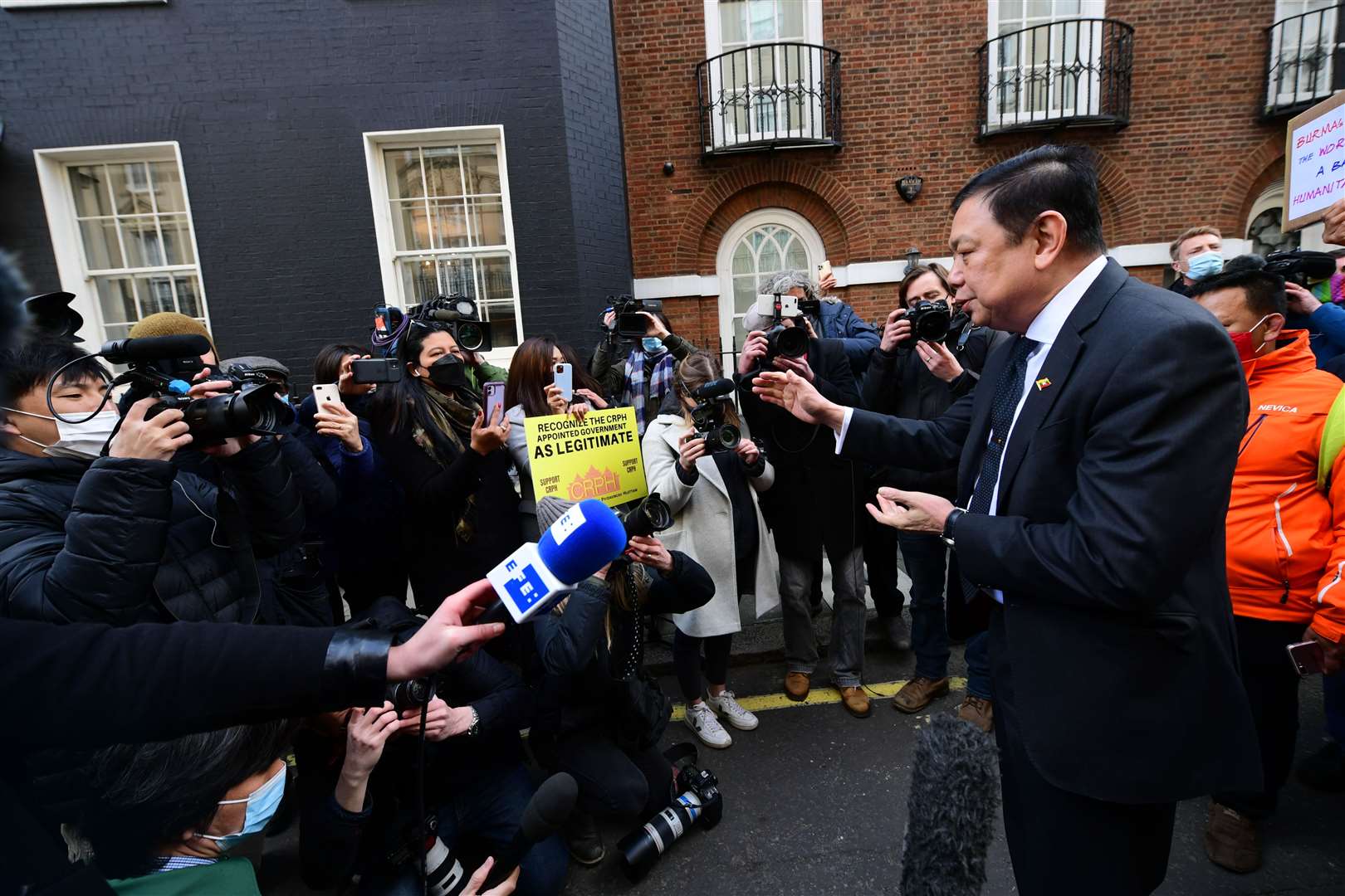 Myanmar’s former ambassador to the UK, Kyaw Zwar Minn, speaks to media outside the Myanmar embassy in Mayfair, London, which he has been barred from entering (Ian West/PA)