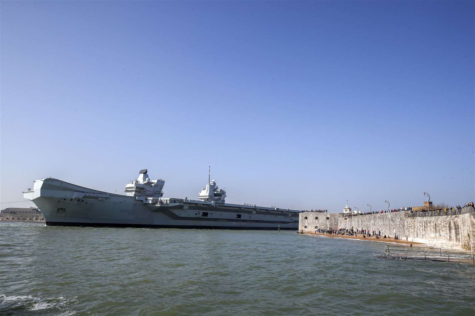 The Royal Navy aircraft carrier HMS Queen Elizabeth leaves Portsmouth Naval Base (Steve Parsons/PA)