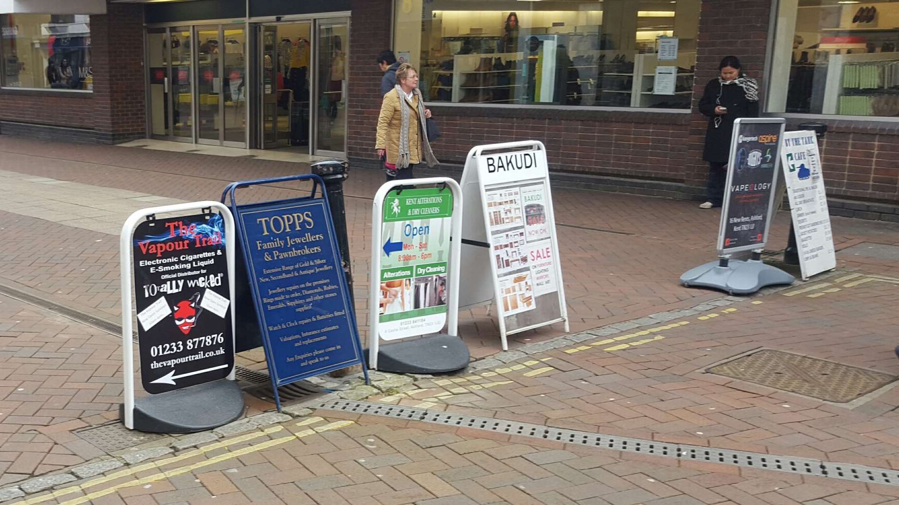 A-boards strung across Ashford High Street